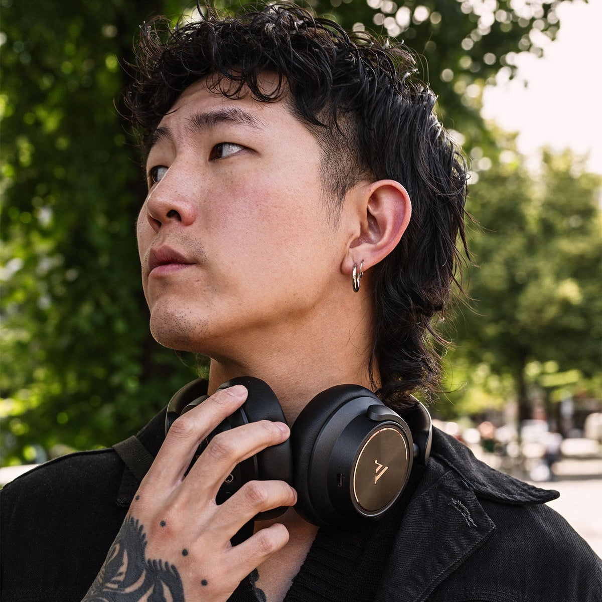 Argon Audio Quiet Storm Black worn around the neck outdoors