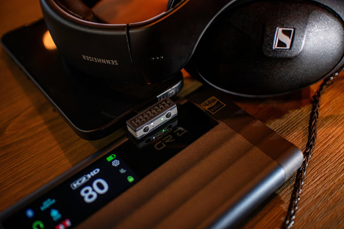 iFi Audio UP Play Max on an iFi iDSD GR 2 next to Sennheiser headphones