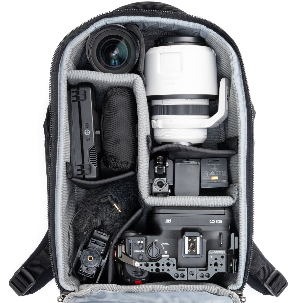 Think Tank Walker Pro Series backpack for video equipment, black camera gear bag with multiple compartments and padded straps.