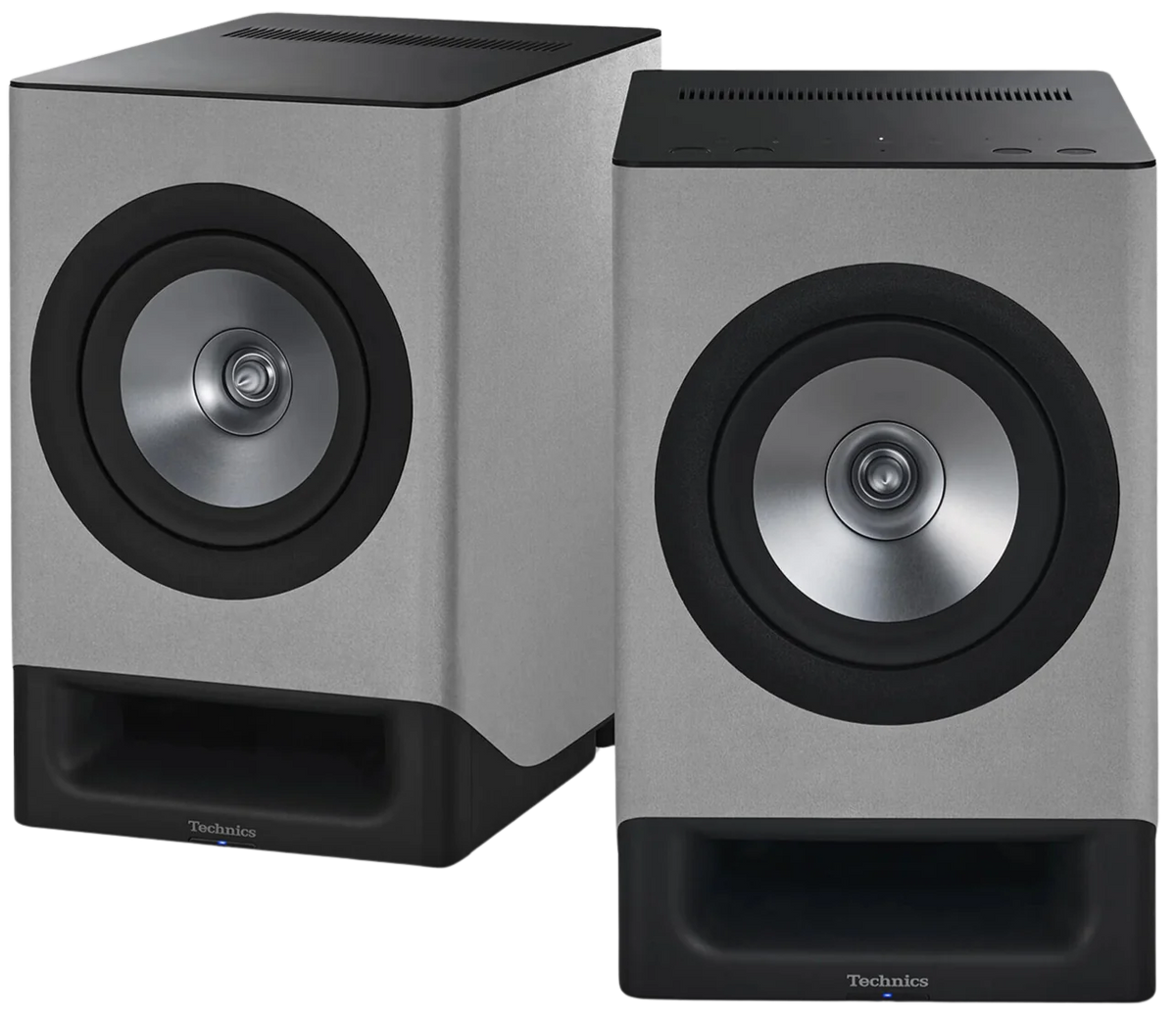 Technics SC-CX700 active bookshelf speakers with sleek black finish, showcasing their compact design and speaker grille.