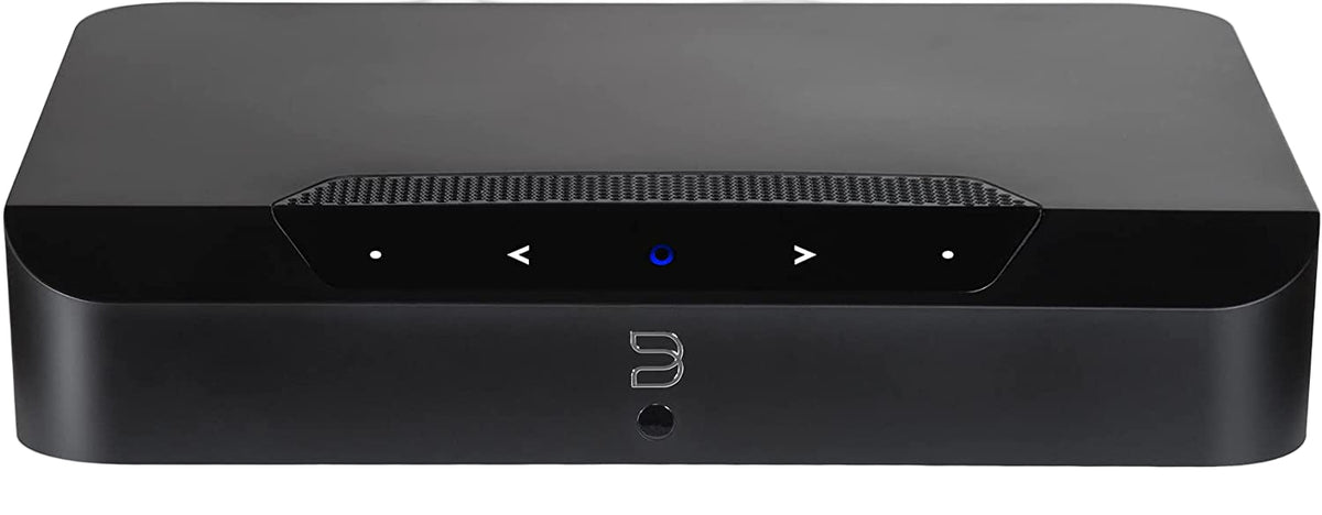 Bluesound Powernode Edge music streamer in black, showing front view with digital display and control buttons.