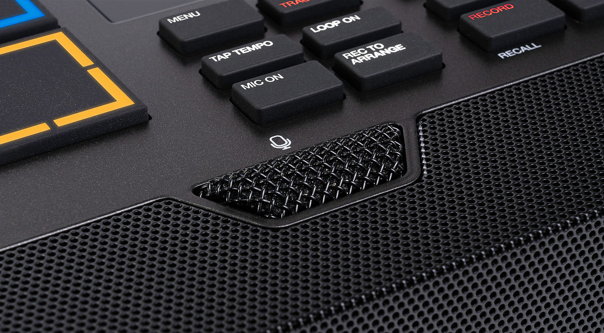 Akai Professional MPC Live III drum machine and sampler with microphone, featuring a sleek control surface and built-in display.
