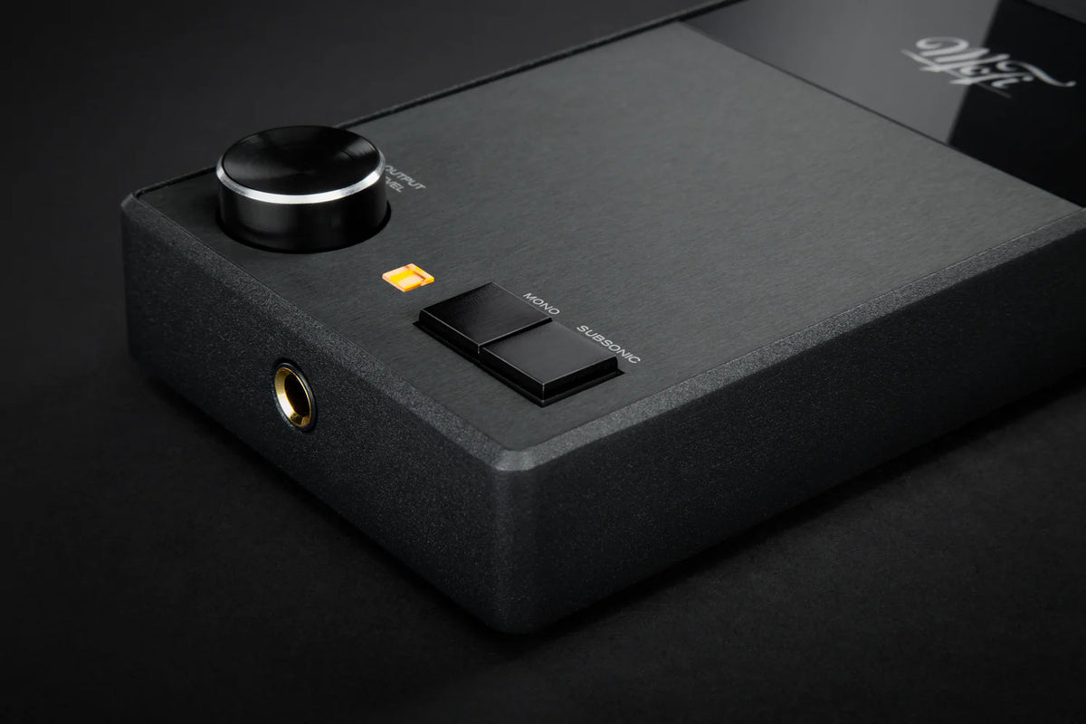 Close-up of MoFi Electronics UltraPhono phono preamp showing detailed control knobs and input connections.