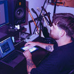 Novation FLpad Mini, played in a home studio next to a laptop running FL Studio